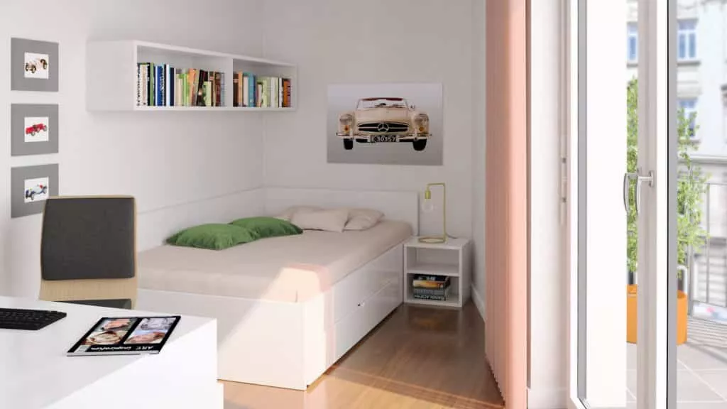 i Live - Nürnberg - Apartment Praia Bett und Schreibtisch